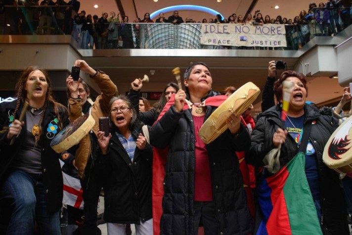 CS_Idle-No-More_Toronto-Eaton-Centre-Round-Dance-flash-mob-low-res-748x500